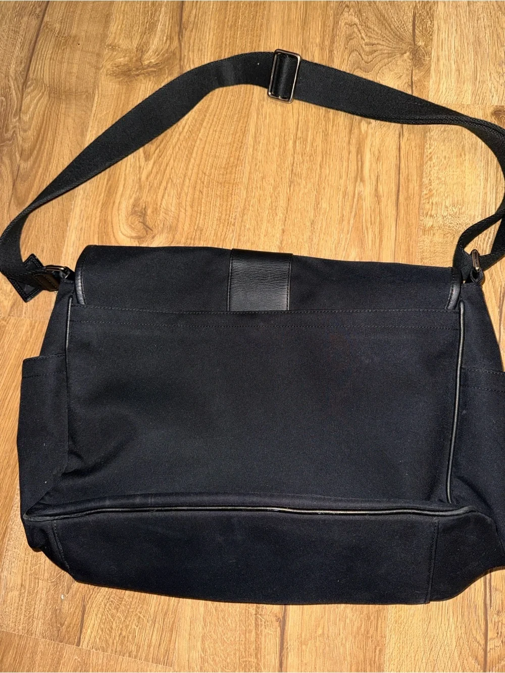 Coach leather trim messenger bag